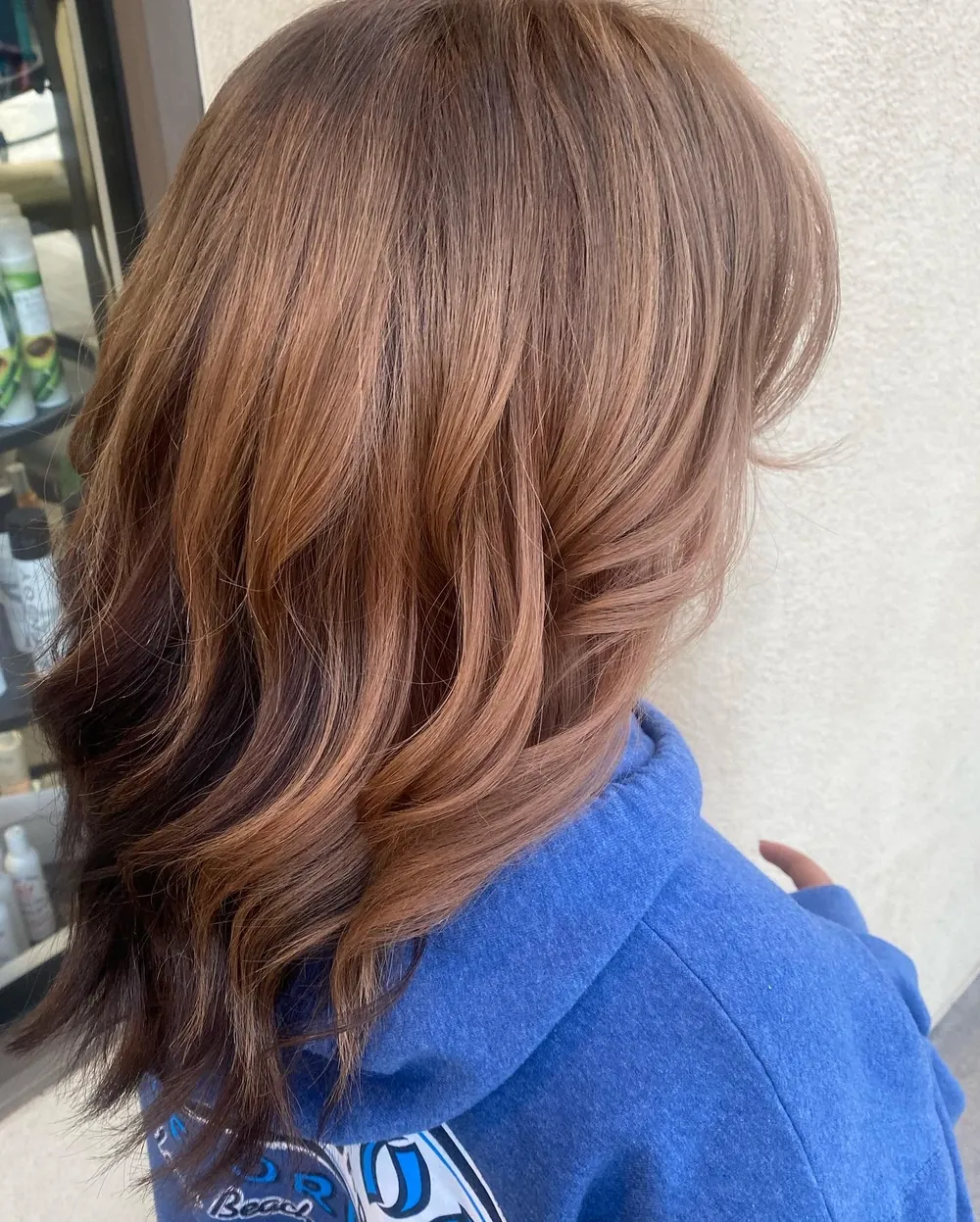 Layered copper hair with soft waves