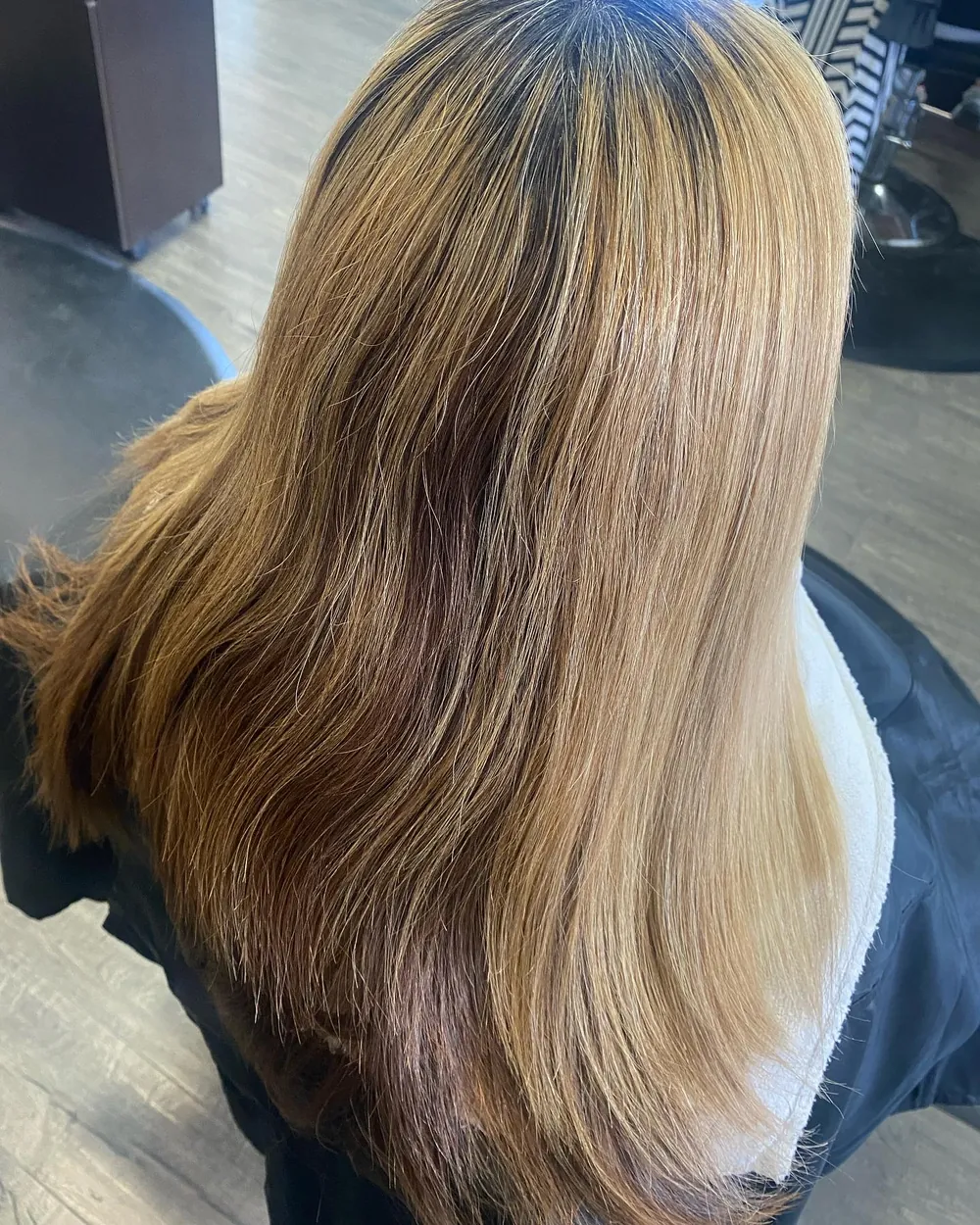 Long golden blonde hair, smooth and straight